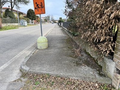 Photo 58 - Sidewalk and sign indicating the probable presence of children