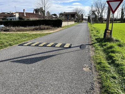 Photo 35 - Paved road with speed bumps