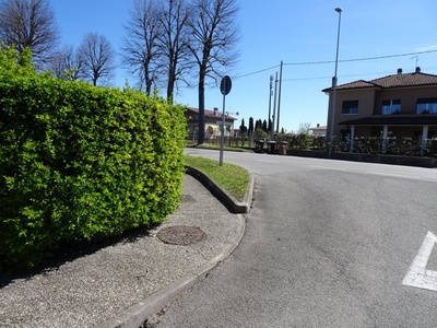 Photo 25 - The path continues on a sidewalk for cycling use