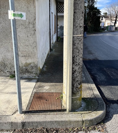 Photo 50 - Continuation on sidewalk with high curb