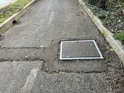 Photo 8 - Protruding manholes