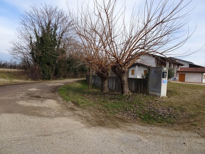 Photo 22 - Path on dirt road next to a house