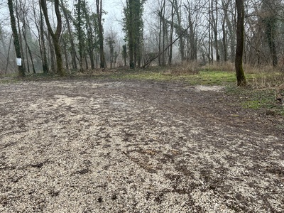 Photo 22 - Clearing with coarse gravel surface for vehicle parking