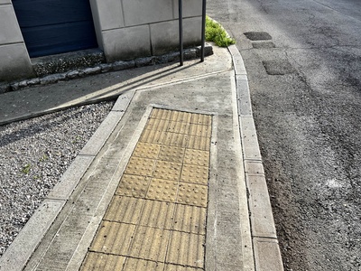 Photo 22 - Sidewalk interruption at the corner with the church